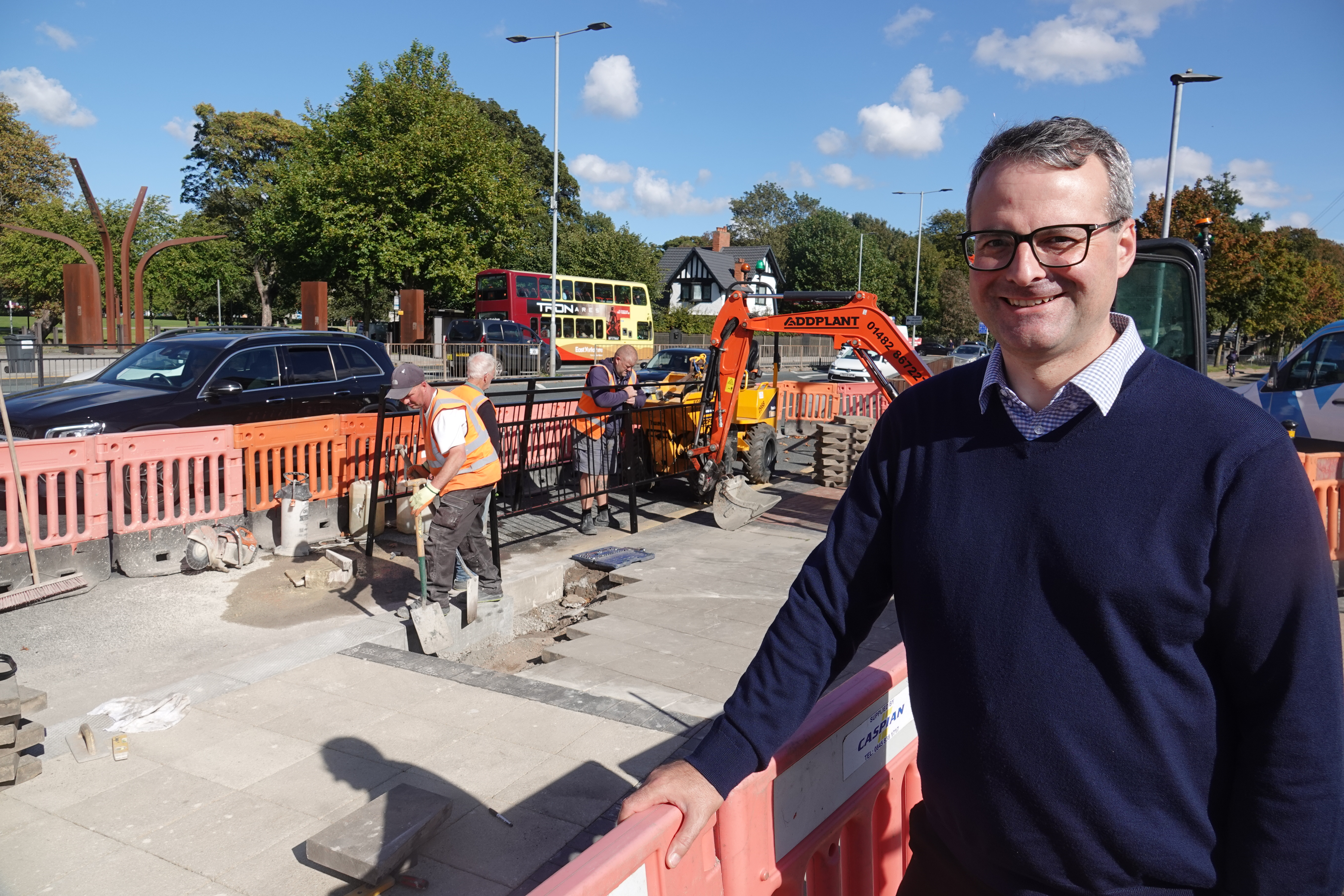 Councillor Mark Ieronimo visits work taking place to raise the kerb-line at a bus stop on Anlaby Road