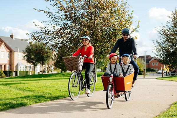 A family cycling in Kingswood, Hull