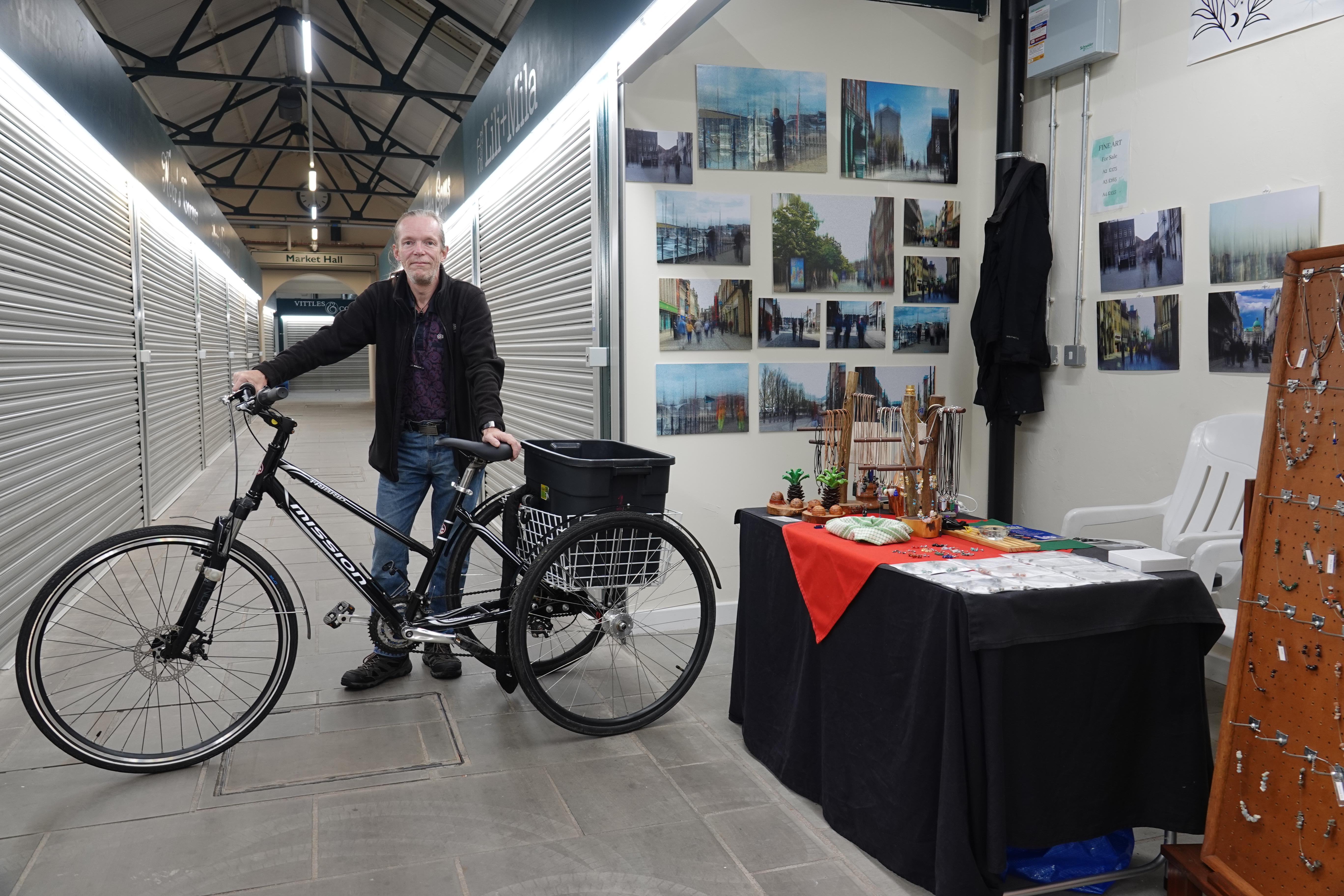 Gavin holborn with his trike and stall at trinity market