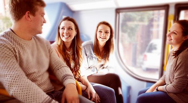 A group of young people on a bus